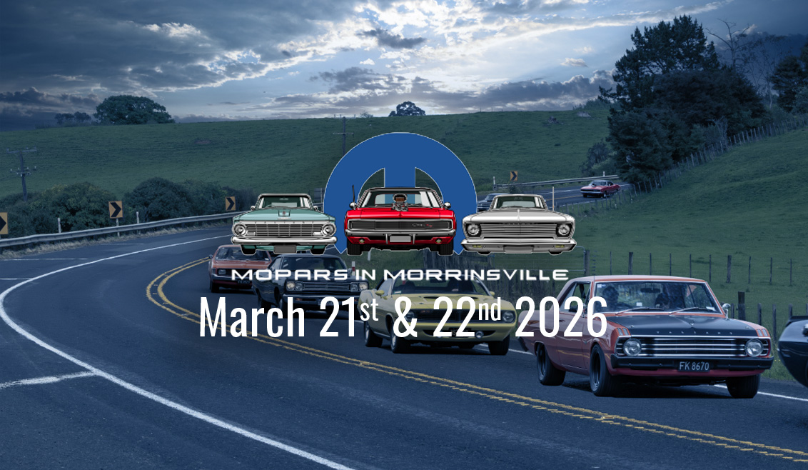 Mopars (car) driving along country road in a line.